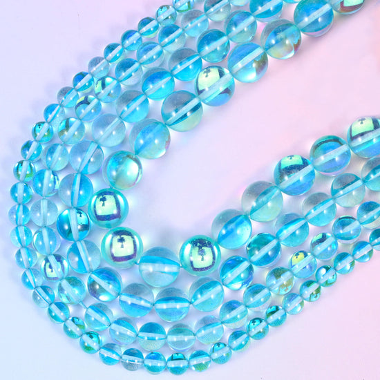 Mystic Aura Light Blue Round Glass Beads: Iridescent Jewelry Making Supply, 15 Inch Strand
