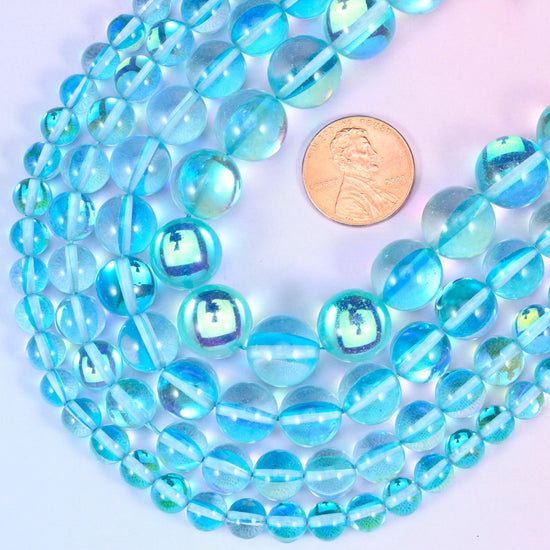 Mystic Aura Light Blue Round Glass Beads: Iridescent Jewelry Making Supply, 15 Inch Strand
