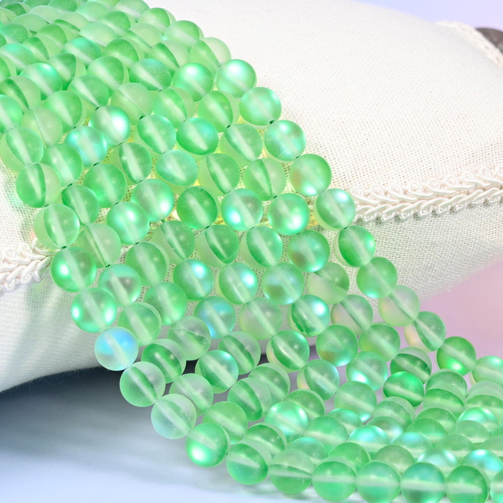 Mystic Aura Matte Light Green Round Glass Beads: Iridescent Jewelry Making Supply