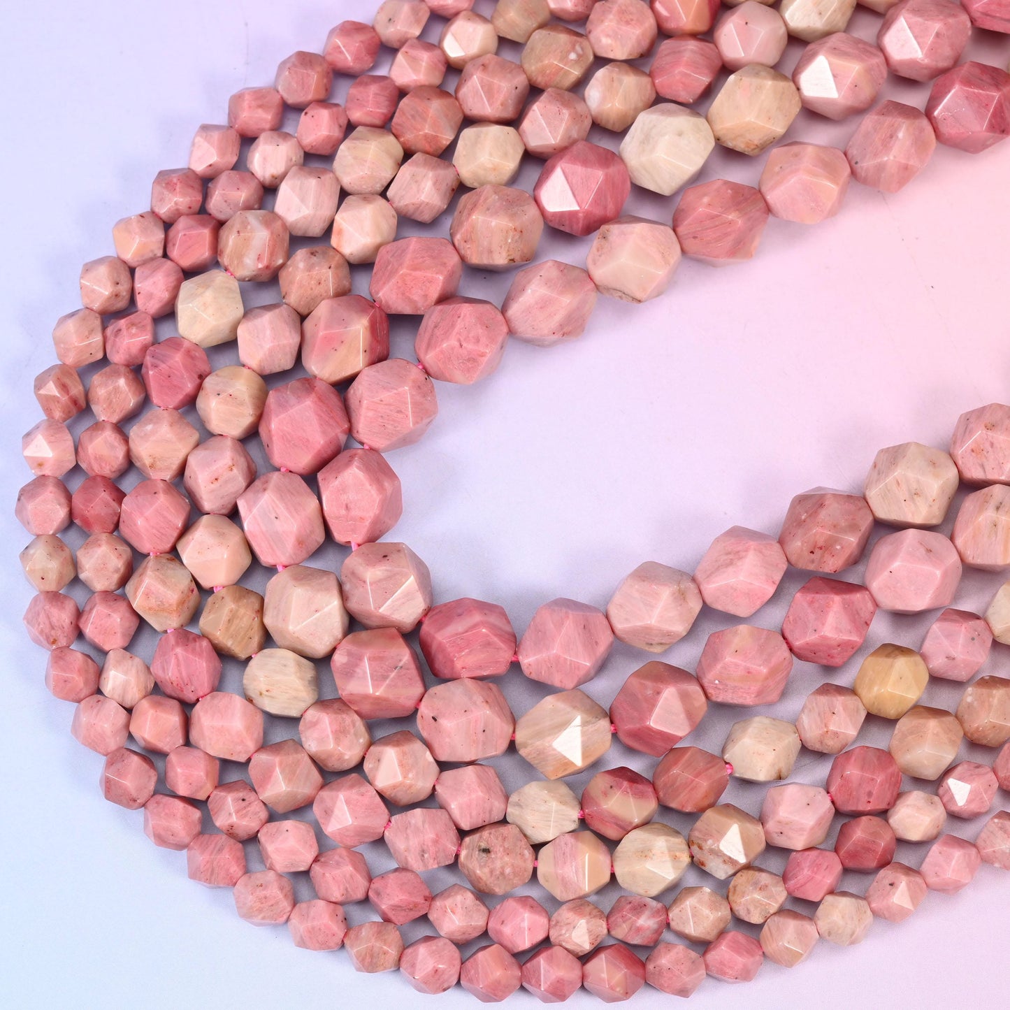 Pink Rhodonite Beads: Faceted Diamond Star Cut, 6-10mm, 15.5 inch Strand