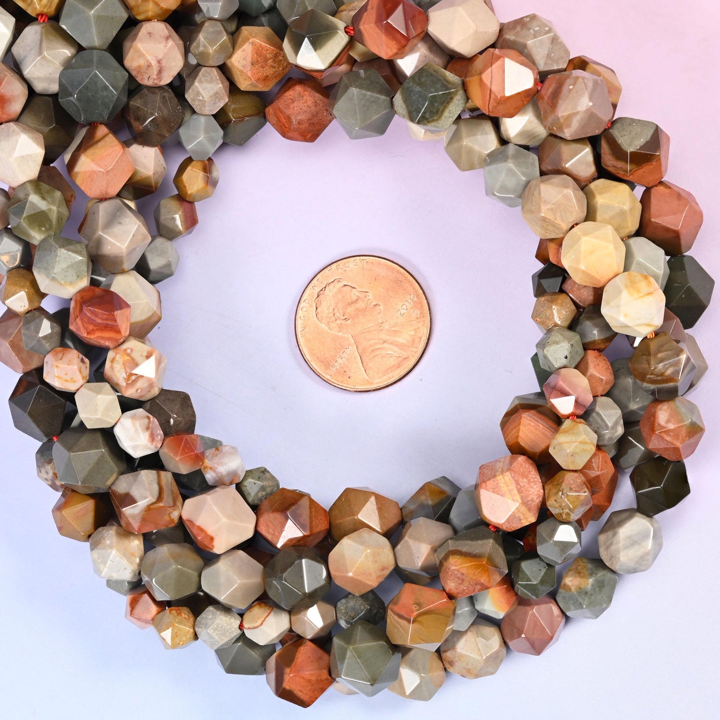 American Picture Jasper Beads: Faceted Diamond Star Cut, 6-10mm, 15.5 inch Strand