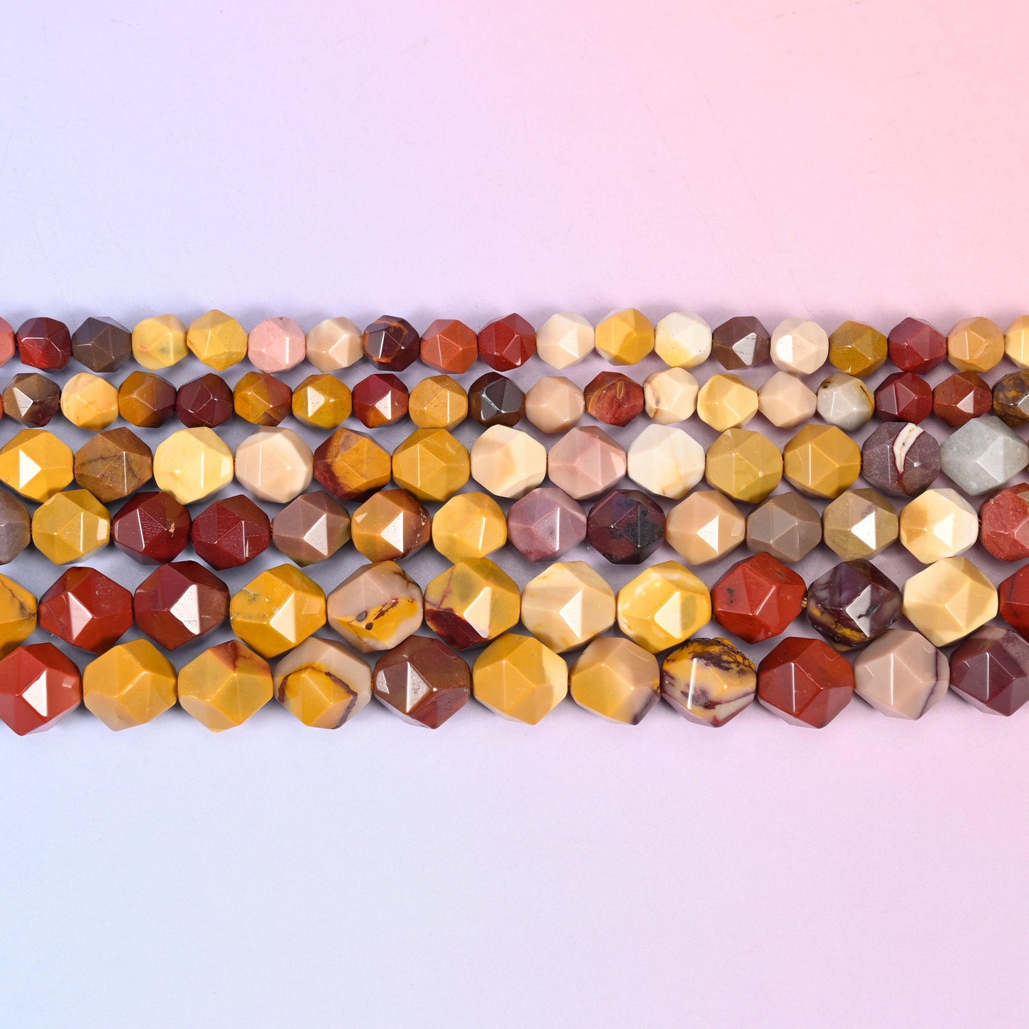 Mookaite Jasper Beads: Faceted Diamond Star Cut, 6-10mm, 15.5 inch Strand