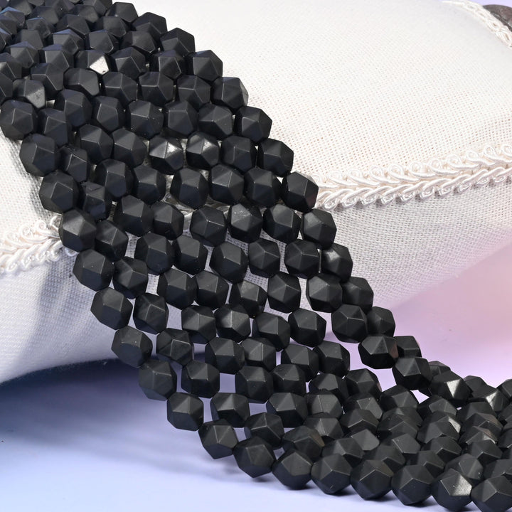 Matte Black Onyx Beads: Faceted Diamond Star Cut, 6-10mm, 15.5 inch Strand