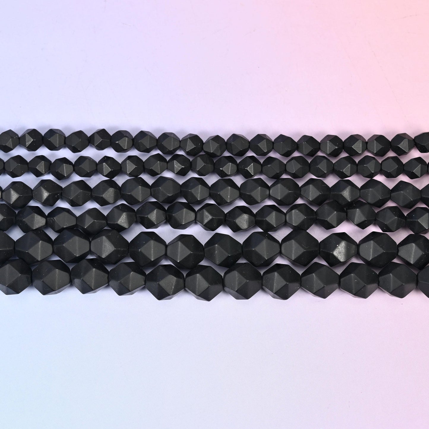 Matte Black Onyx Beads: Faceted Diamond Star Cut, 6-10mm, 15.5 inch Strand