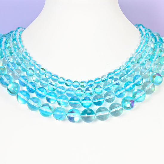 Mystic Aura Light Blue Round Glass Beads: Iridescent Jewelry Making Supply, 15 Inch Strand