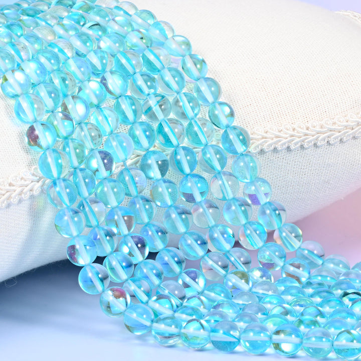 Mystic Aura Light Blue Round Glass Beads: Iridescent Jewelry Making Supply, 15 Inch Strand