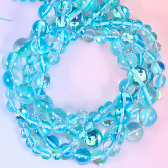 Mystic Aura Light Blue Round Glass Beads: Iridescent Jewelry Making Supply, 15 Inch Strand