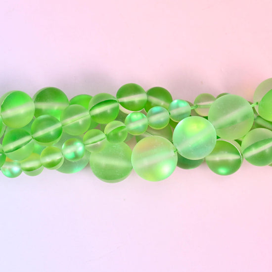 Mystic Aura Matte Light Green Round Glass Beads: Iridescent Jewelry Making Supply