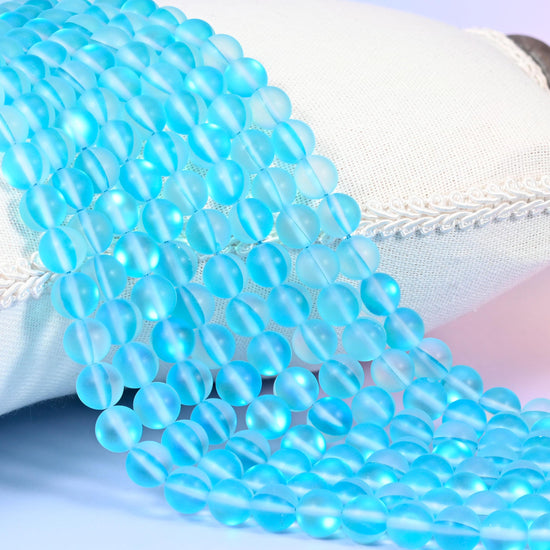 Mystic Aura Matte Light Blue Round Glass Beads: Iridescent Jewelry Making Supply