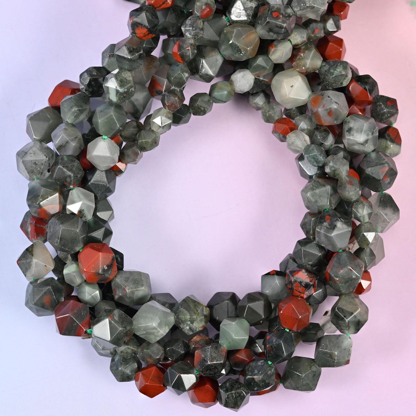African Bloodstone Beads: Faceted Diamond Star Cut, 6-10mm, 15.5 inch Strand