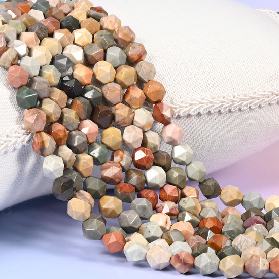 American Picture Jasper Beads: Faceted Diamond Star Cut, 6-10mm, 15.5 inch Strand