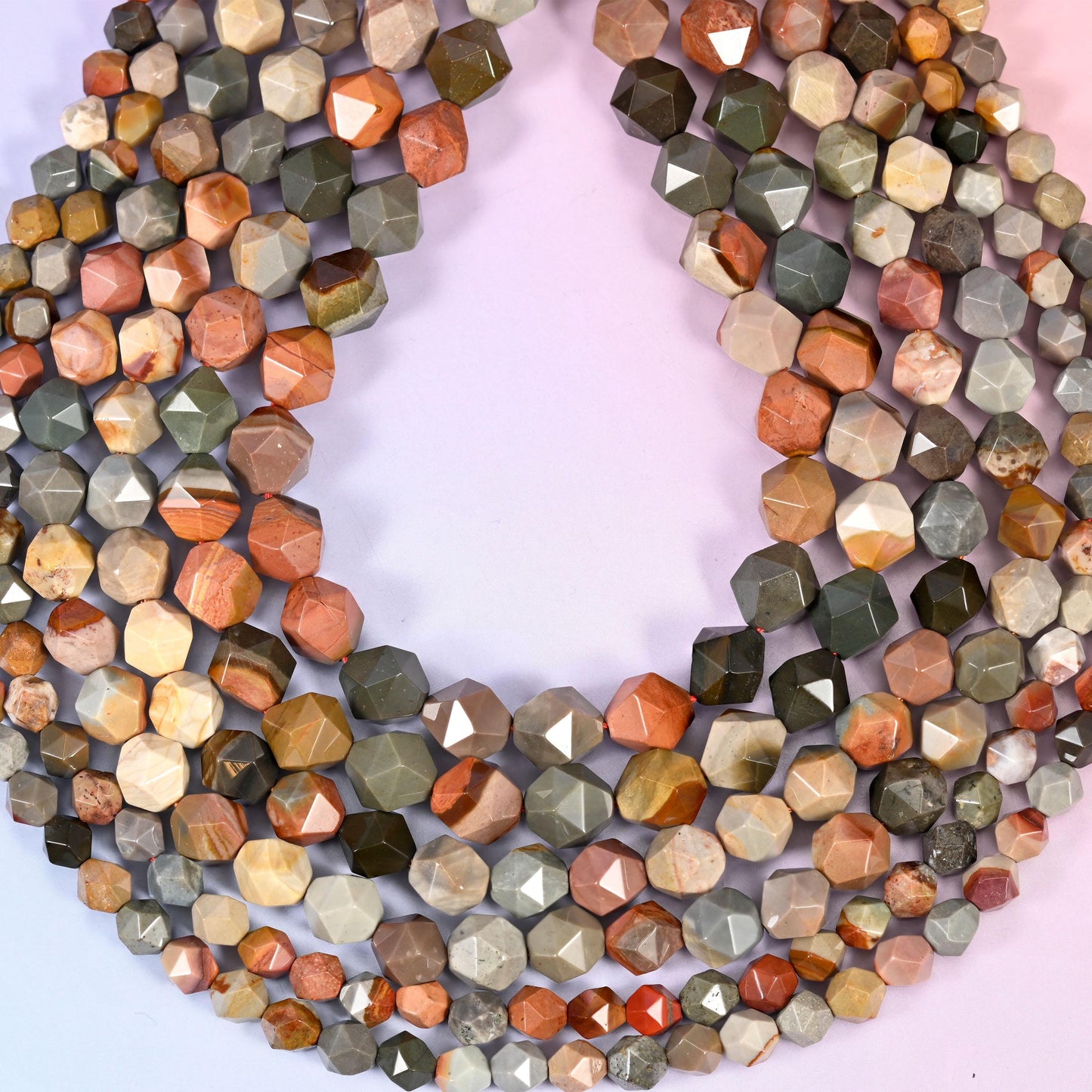 American Picture Jasper Beads: Faceted Diamond Star Cut, 6-10mm, 15.5 inch Strand