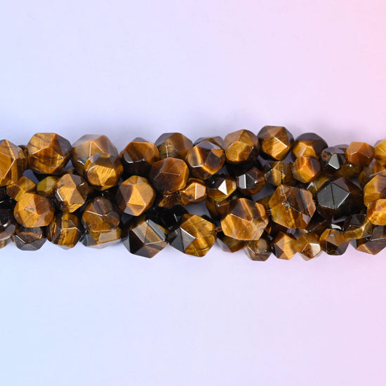 Tiger Eye Beads: Faceted Diamond Star Cut, 6-10mm, 15.5 inch Strand