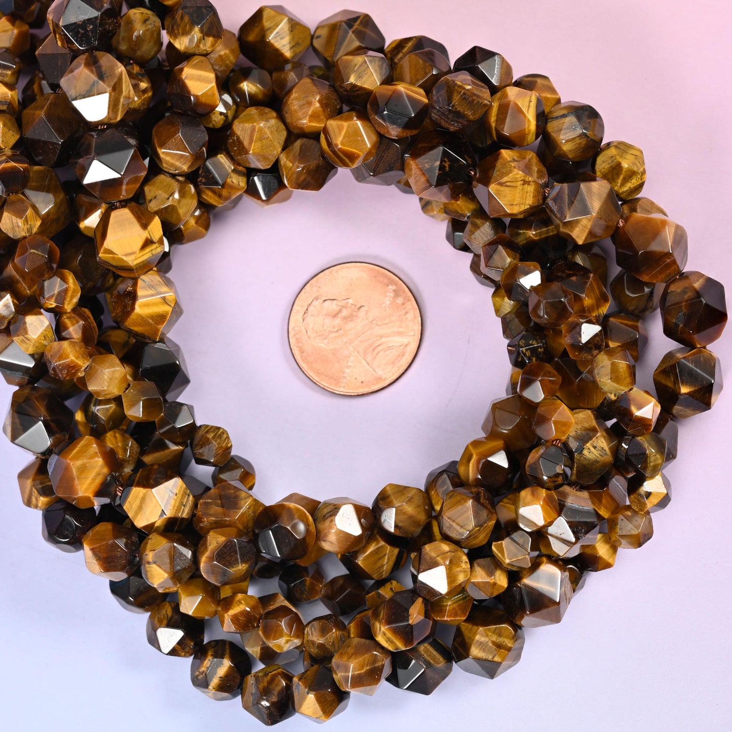 Tiger Eye Beads: Faceted Diamond Star Cut, 6-10mm, 15.5 inch Strand