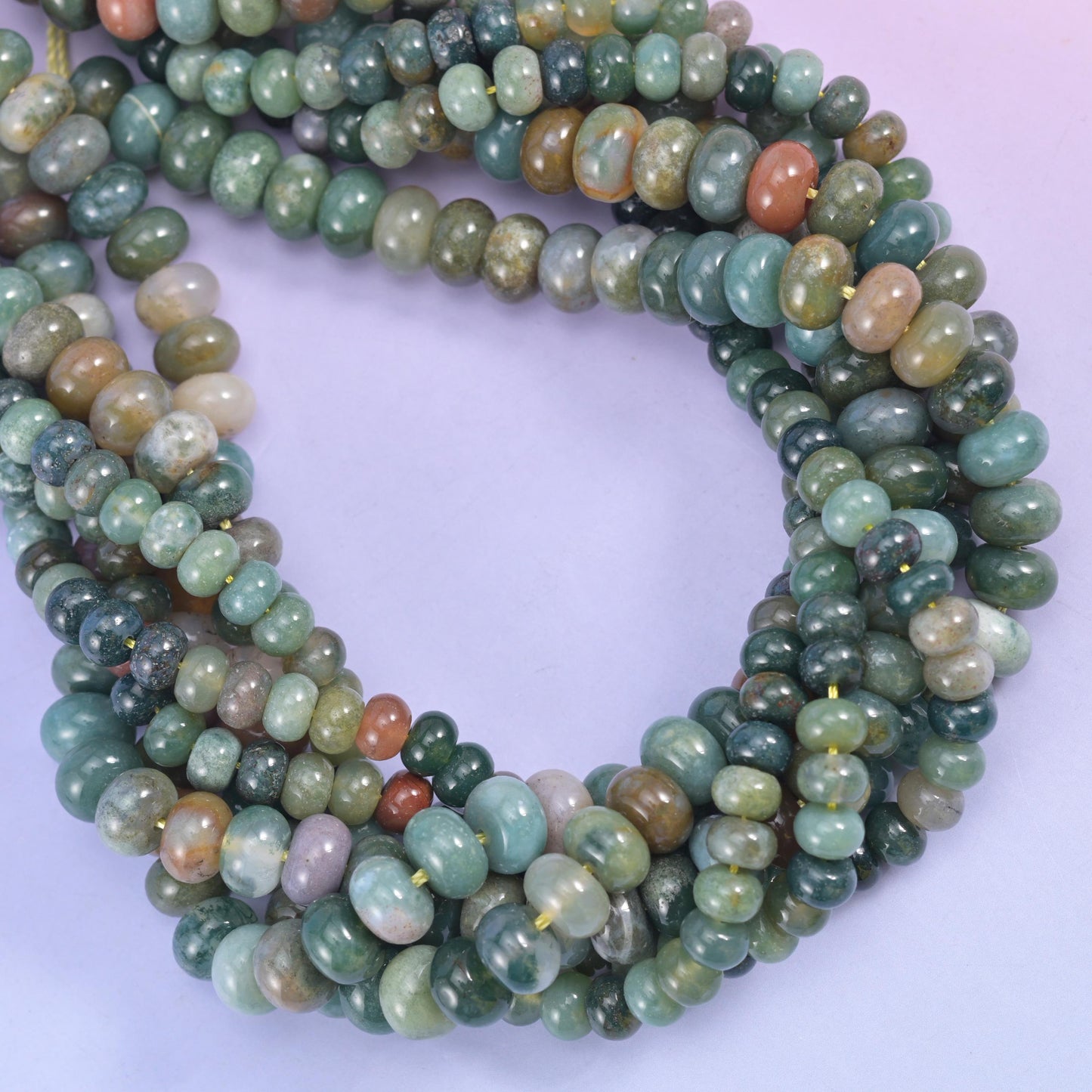 Indian Agate smooth rondelle beads coiled into a loop, mixed green, tan and grey banding