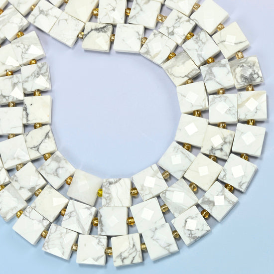 White howlite faceted flat square beads curved into an open loop, white beads with gray veins