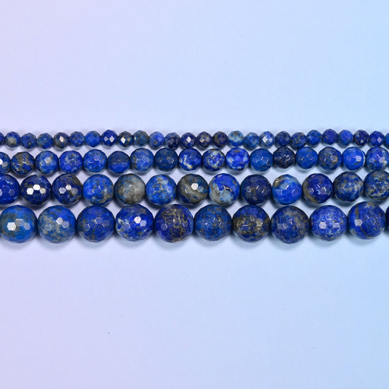 Lapis Lazuli faceted rounds shot through with gold pyrite and grey-white calcite.