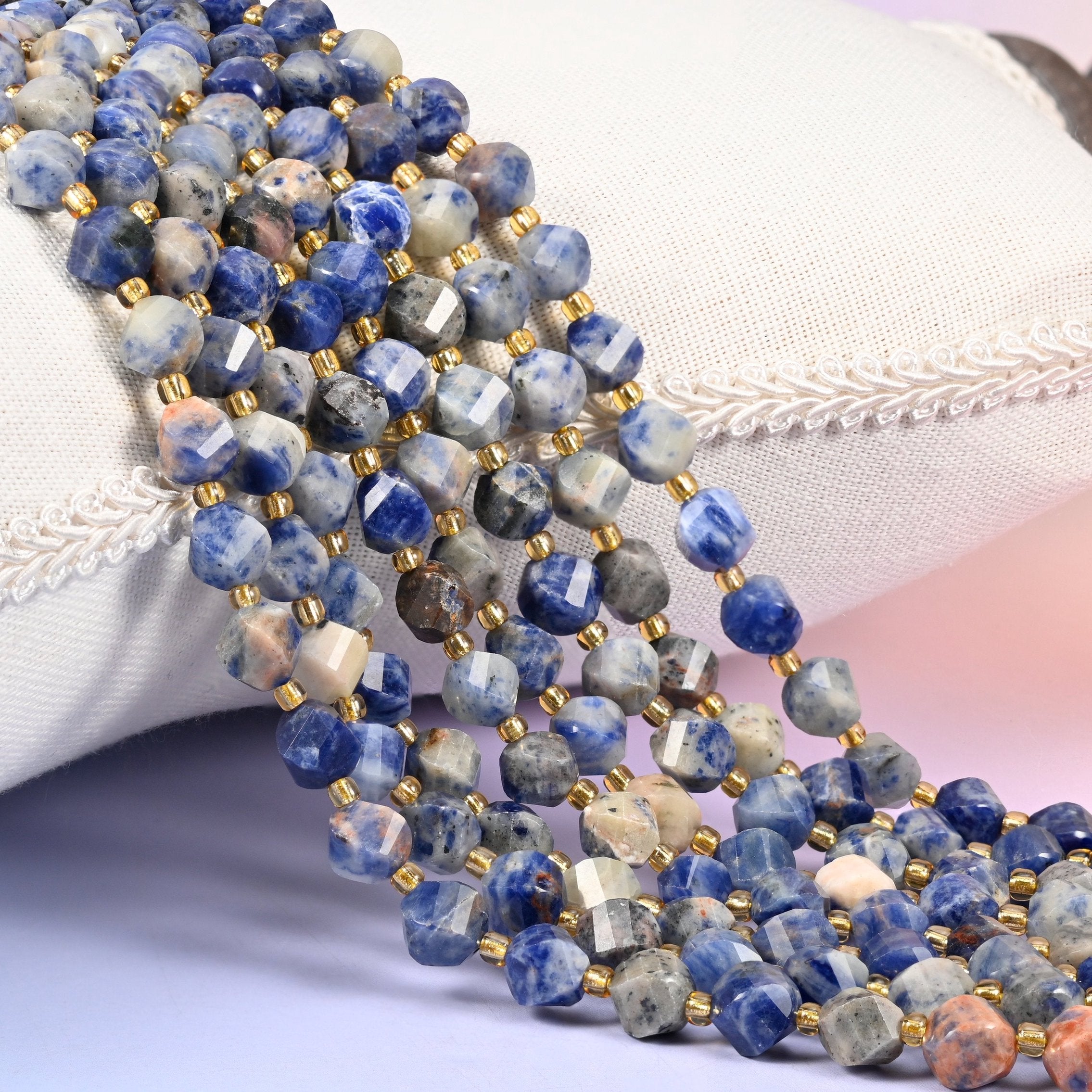 Orange Sodalite faceted spiral twist beads