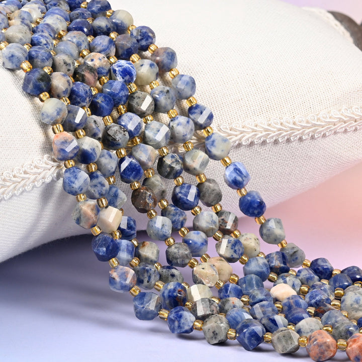 Orange Sodalite faceted spiral twist beads