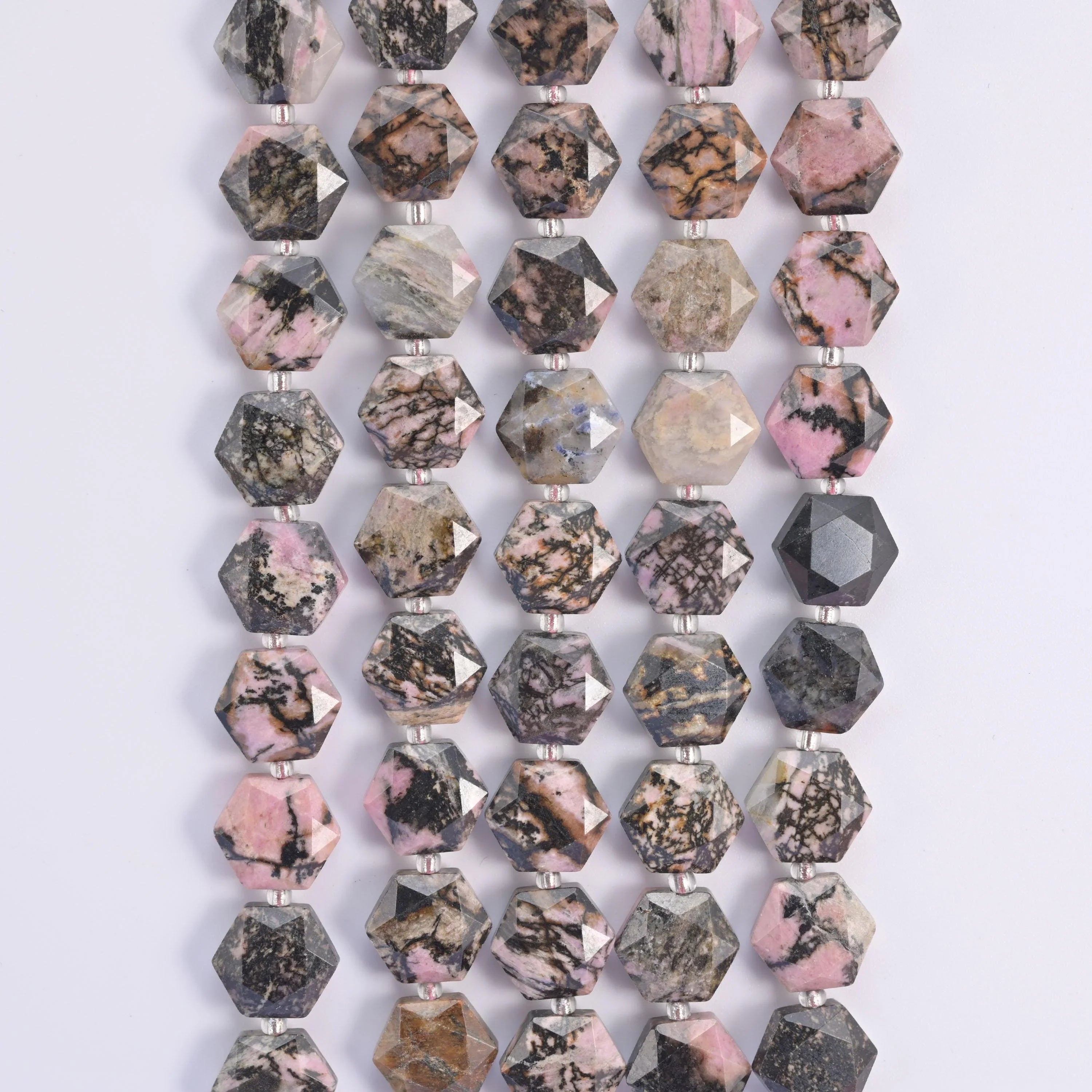 Rhodonite hexagon beads, 15.5 inch strand.