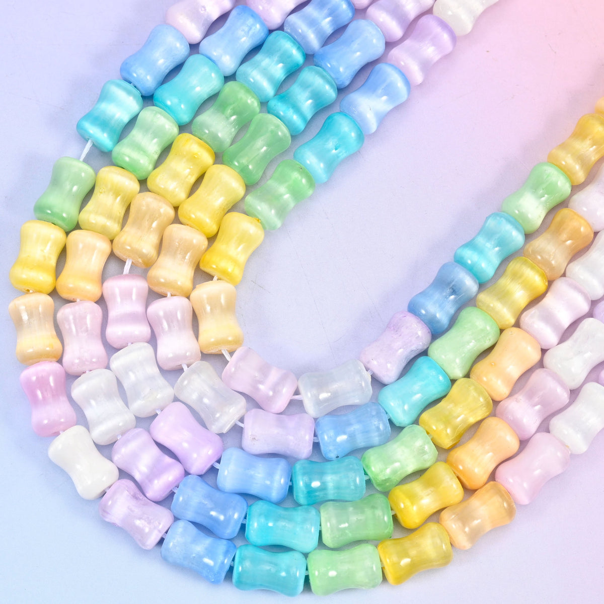Bamboo shaped cut Rainbow Selenite beads.