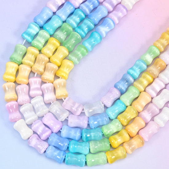 Bamboo shaped cut Rainbow Selenite beads.