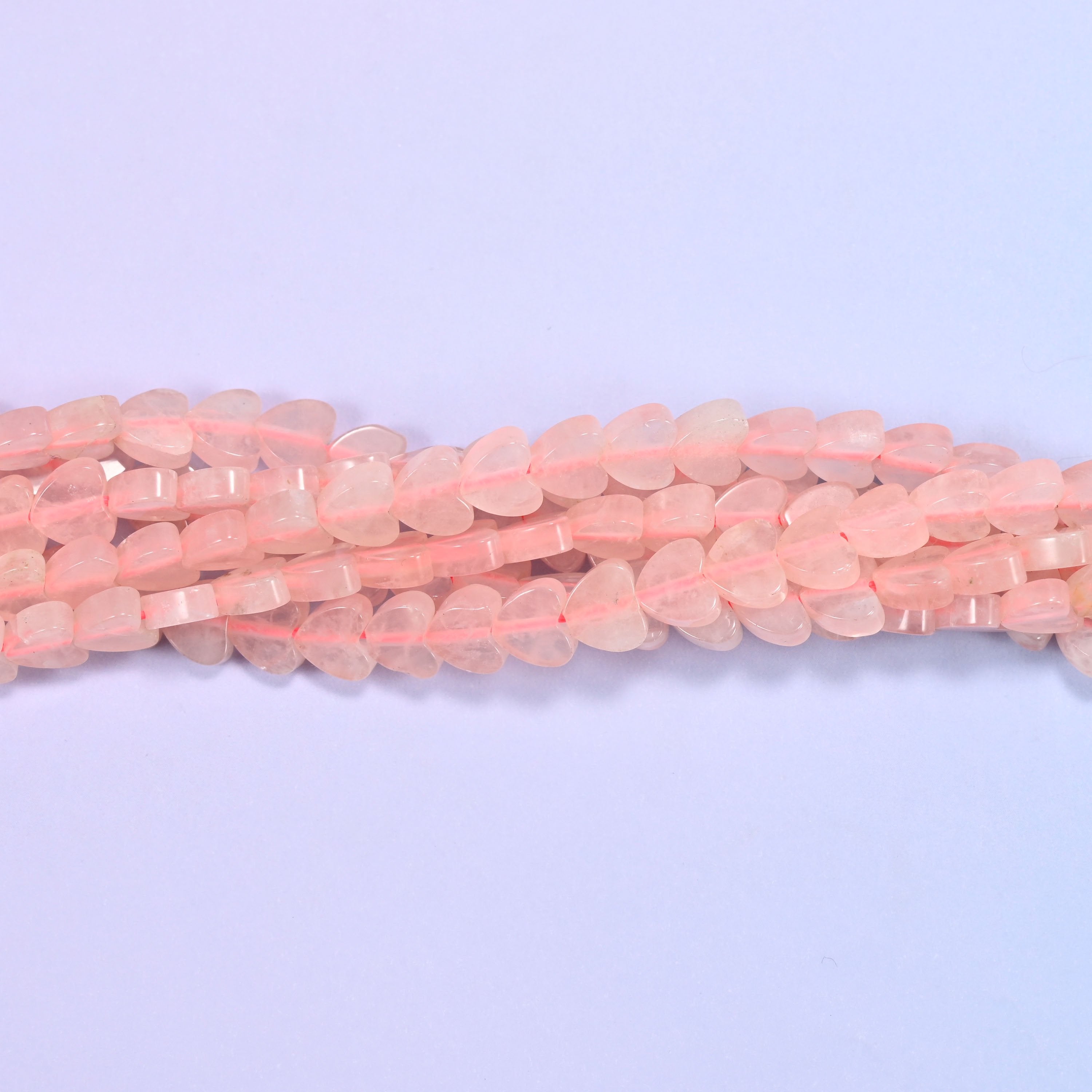 Rose Quartz Flat Heart Beads, small flat hearts in a soft powdery blush pink with rounded shoulders