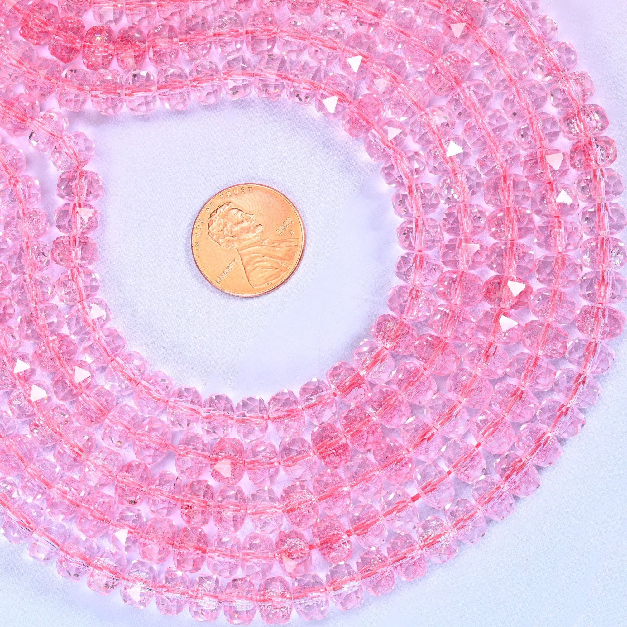 Transparent Pink Faceted Rondelle Glass Beads, approximately 82 beads per strand