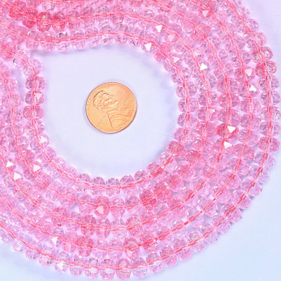 Transparent Pink Faceted Rondelle Glass Beads, approximately 82 beads per strand