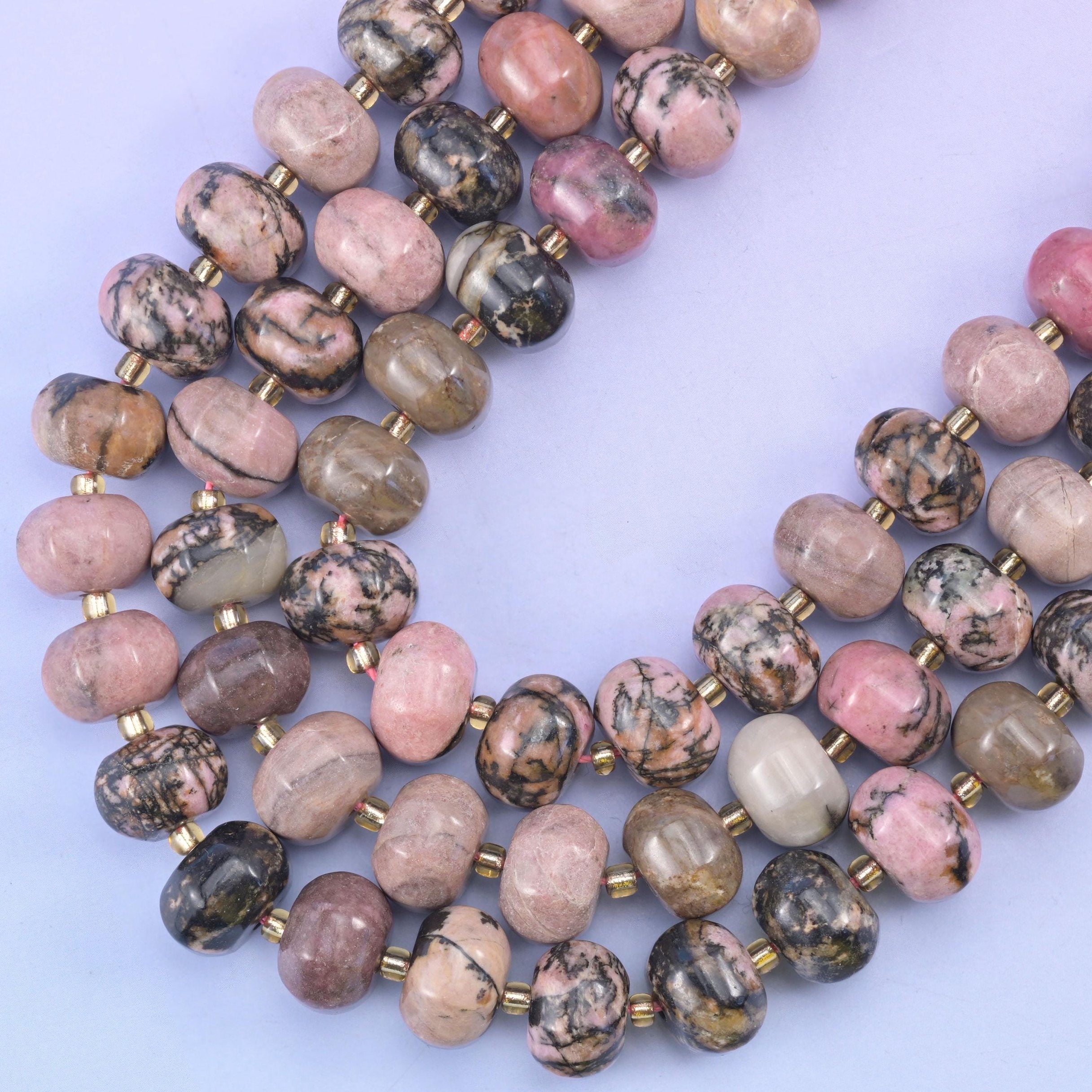 Smooth pumpkin cut rhodonite beads