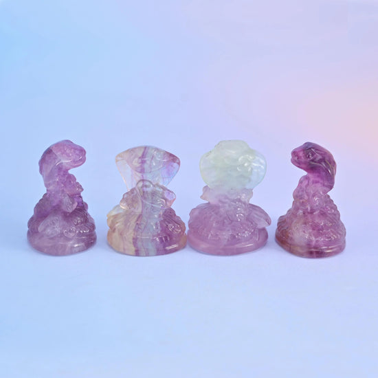 Fluorite cobra snake figurine on a small domed base.