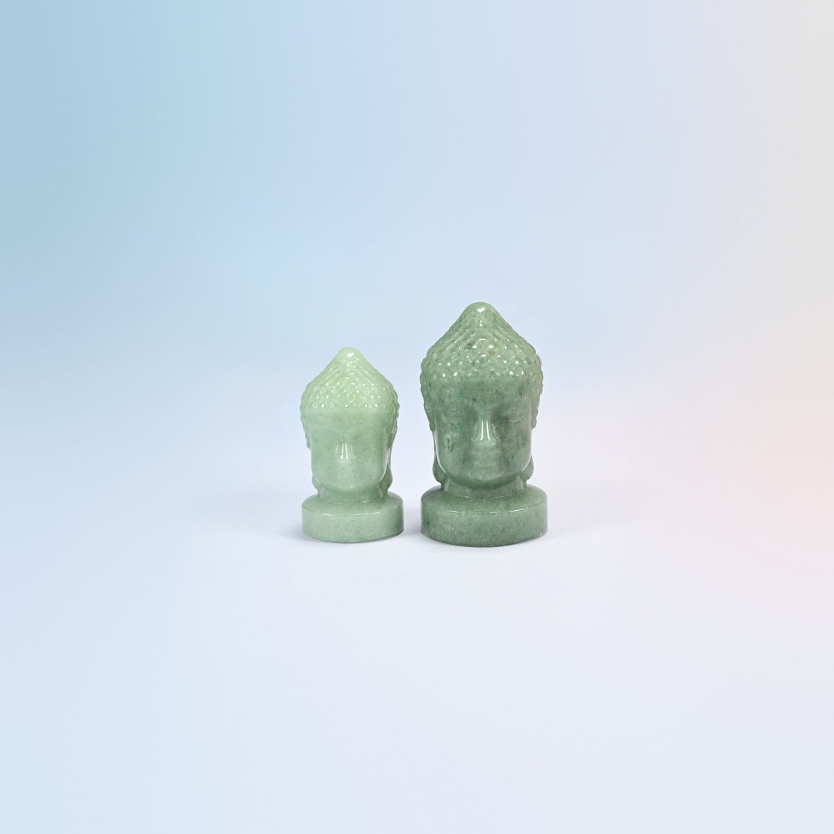 Natural green aventurine Buddha head carvings in soft green, 1.5 inch and 2 inch