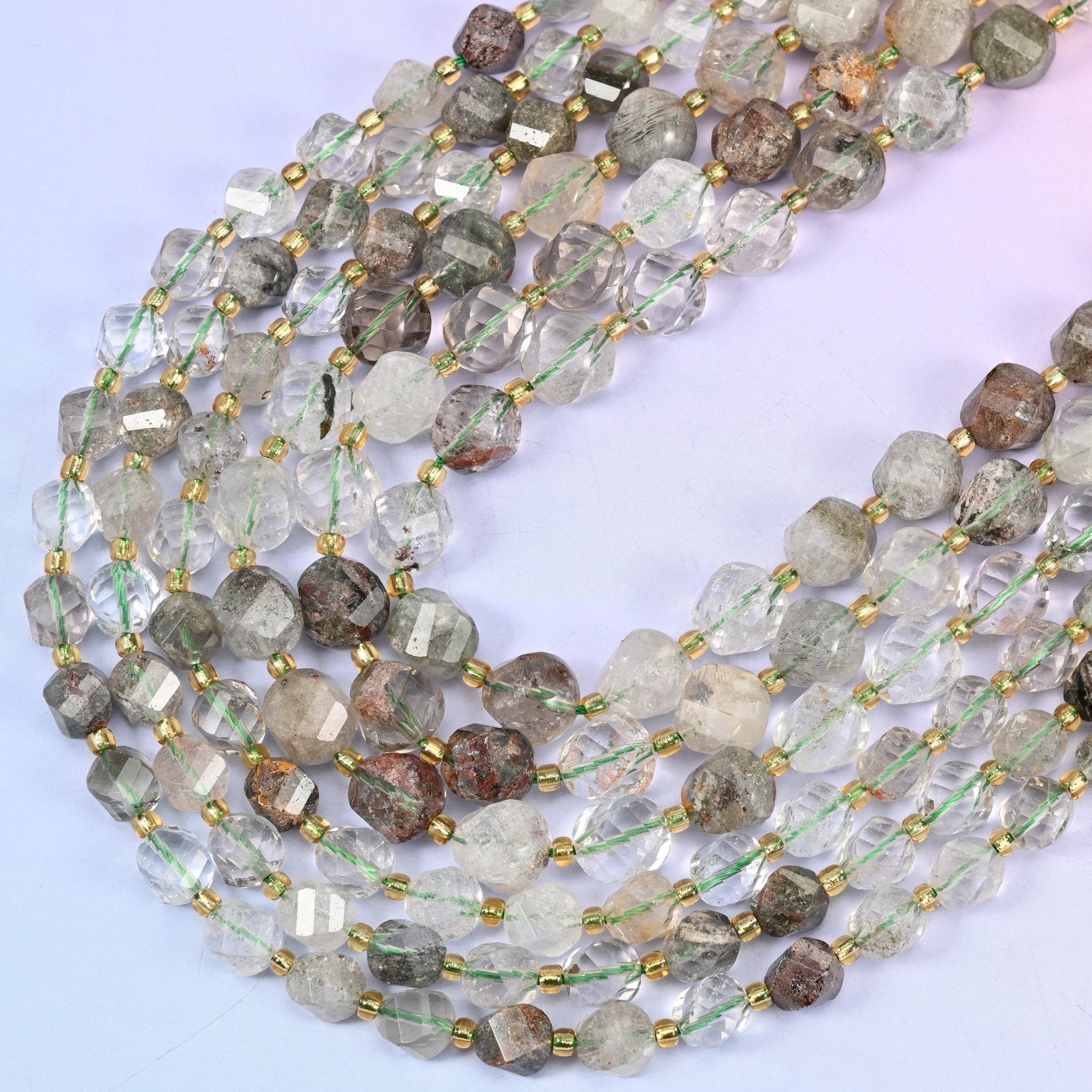 Green Phantom Quartz faceted spiral twist beads, 15 inch strand