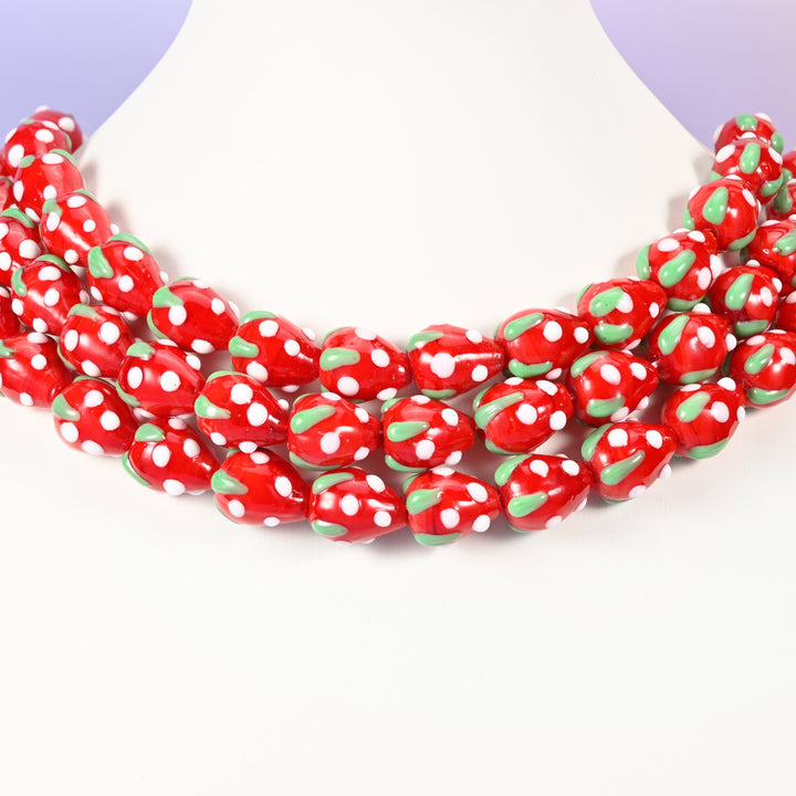 Strawberry glass beads, red with white dots, 15.5x12mm
