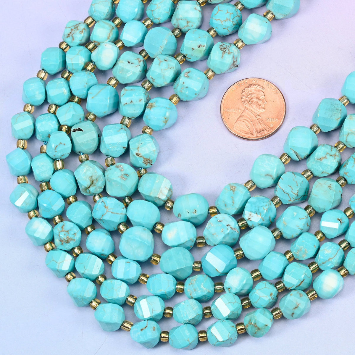 Faceted spiral twist cut Dyed Light Blue Howlite beads