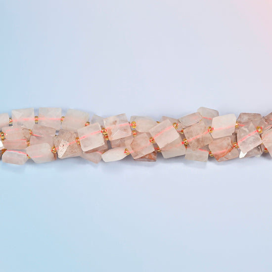 Strands of natural red hematoid quartz faceted flat square beads twisted together in a horizontal row