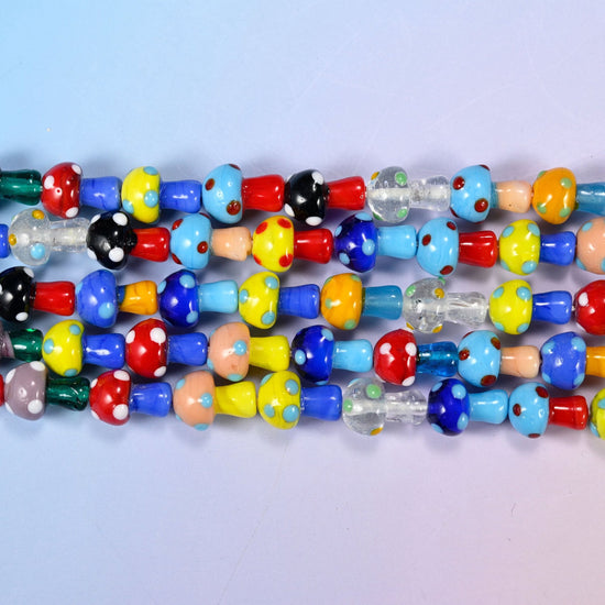 Mushroom glass beads in a mixed polka dot colour run