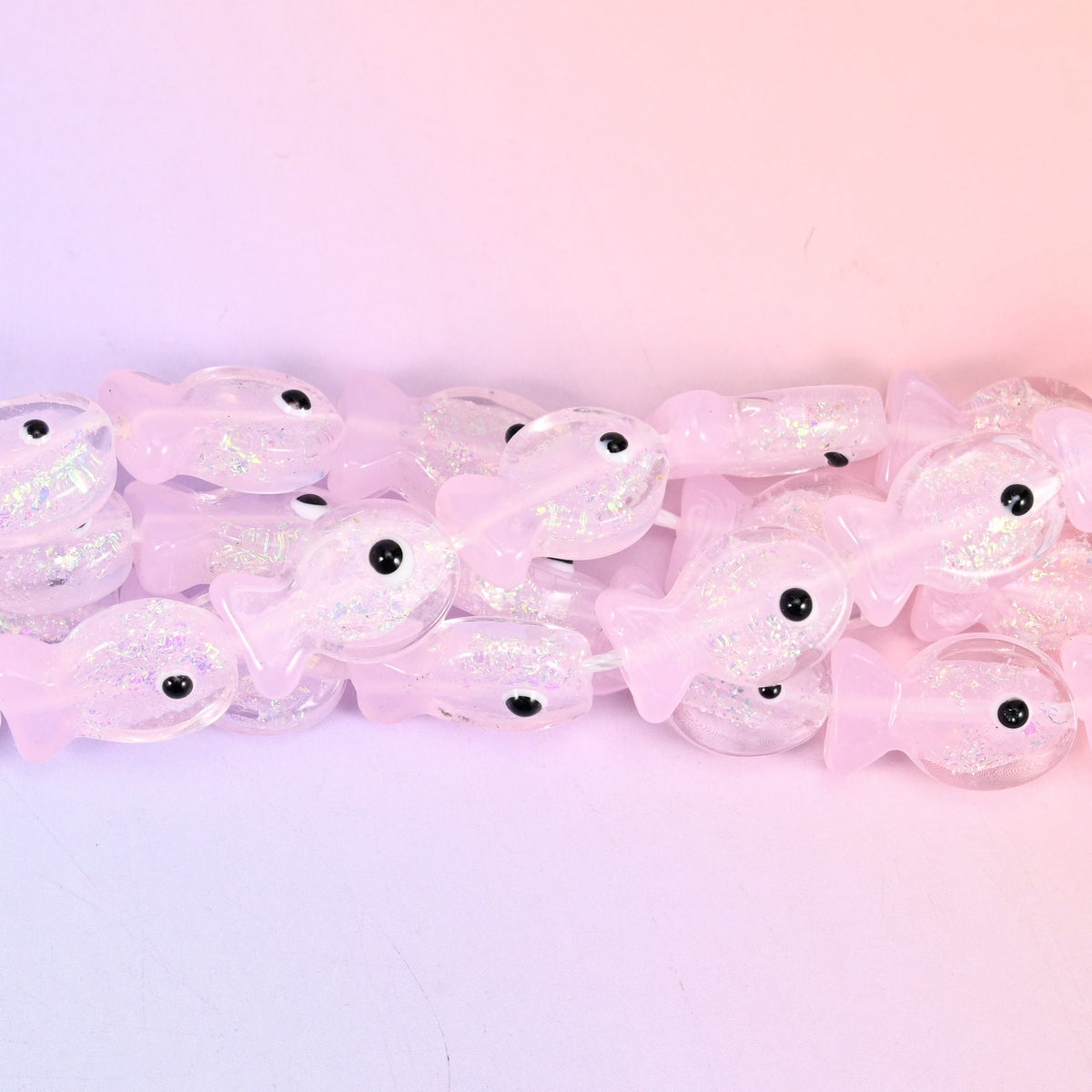 Iridescent Pink Fish Glass Beads, 20 pieces per strand