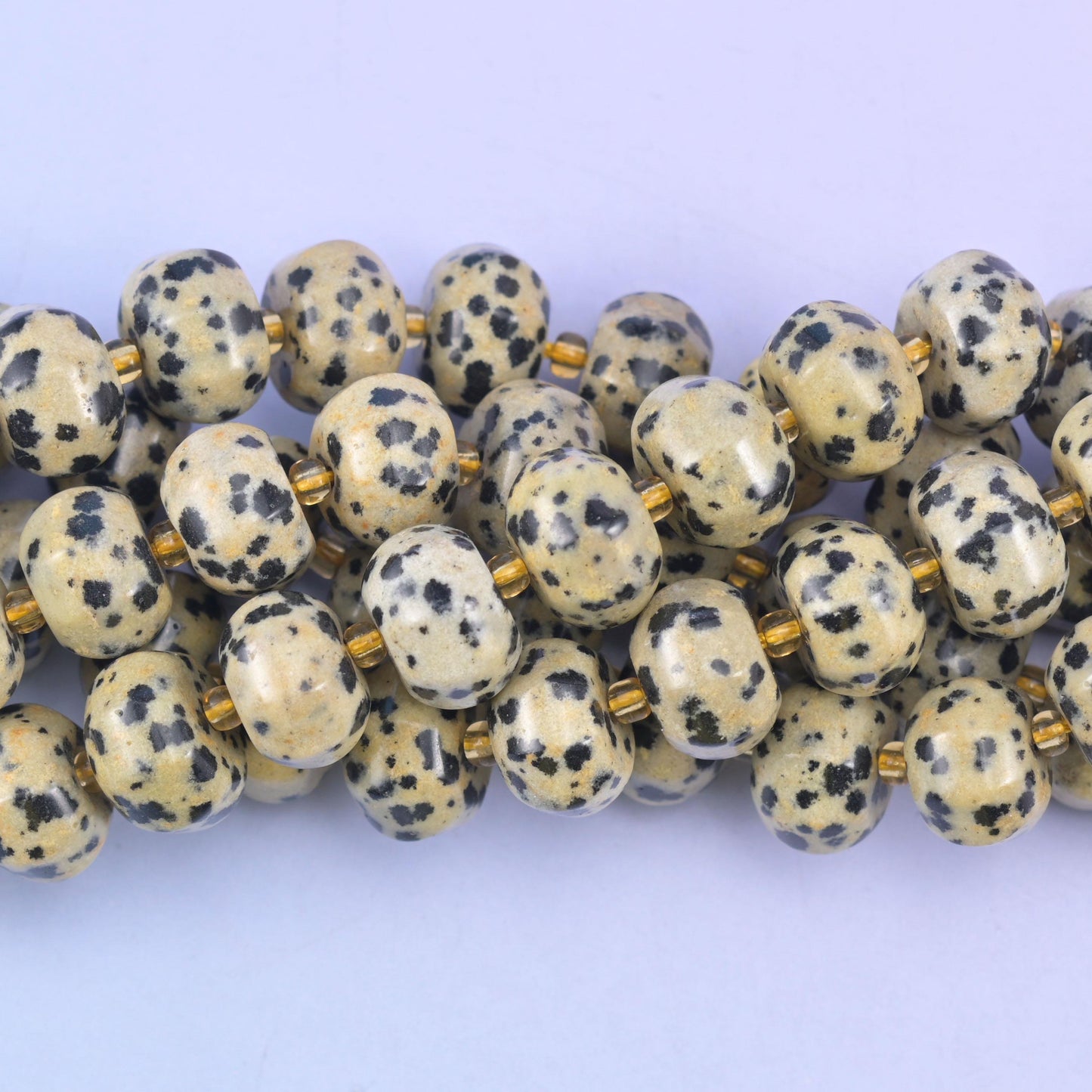 Smooth pumpkin cut Dalmatian jasper beads