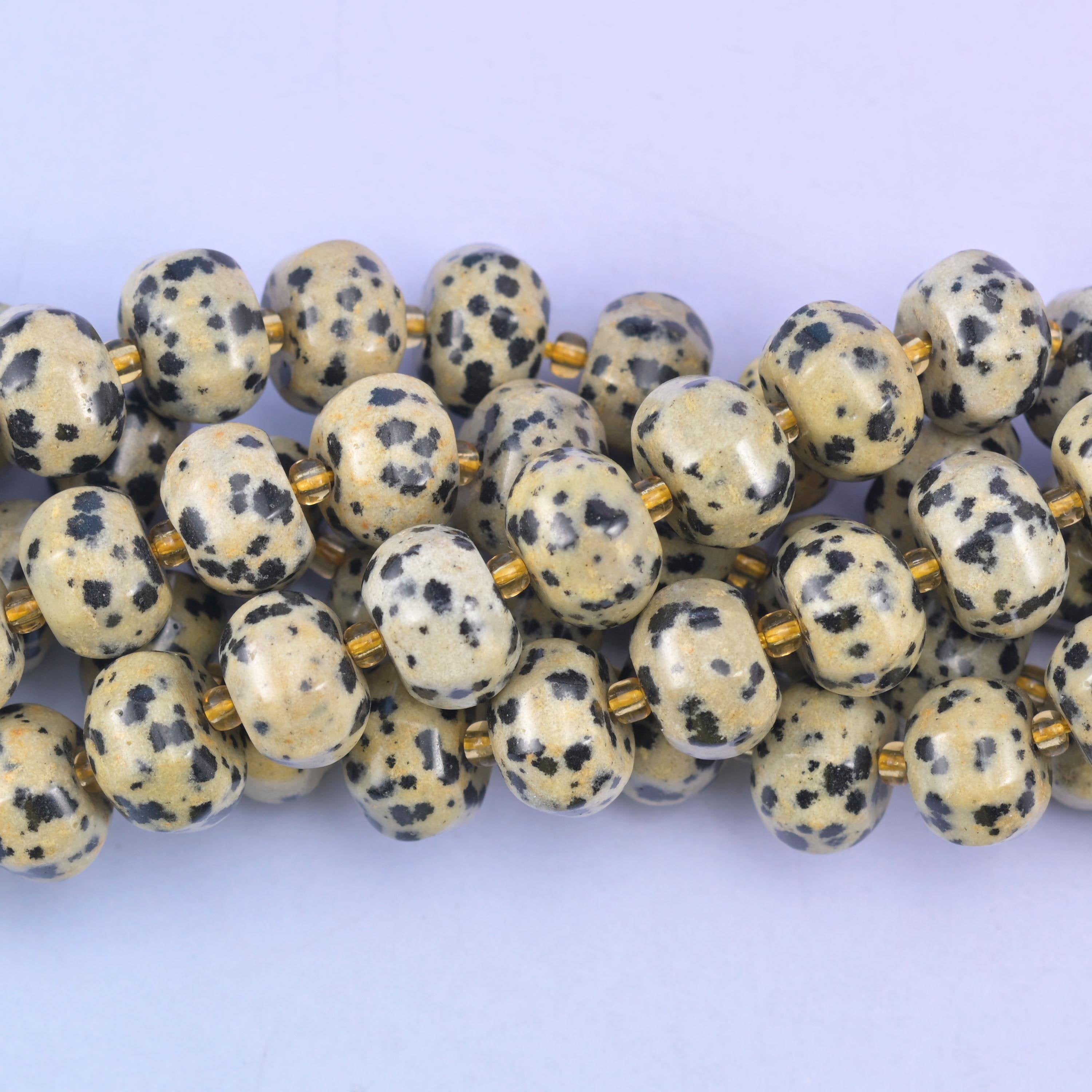Smooth pumpkin cut Dalmatian jasper beads