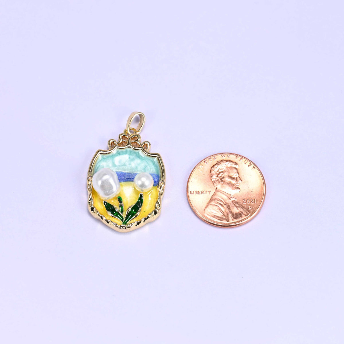 Enamel ornate shield tulip charm, approximately 26mm x 19mm