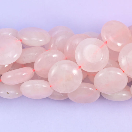 Coin cut Rose Quartz beads with a glassy high polish
