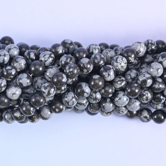 Smooth round cut snowflake jasper beads