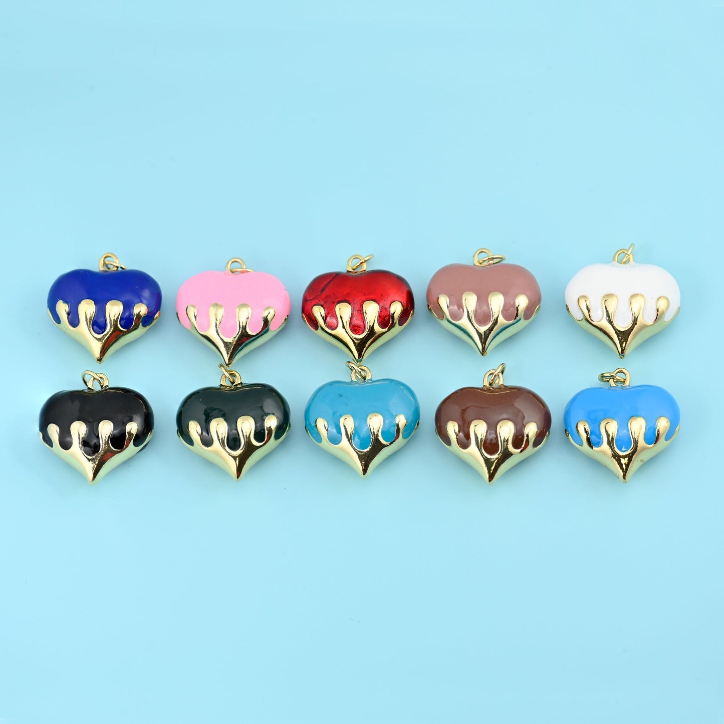 Brass beads, puffy heart with a gold drip finish, 20.33 x 19.88mm