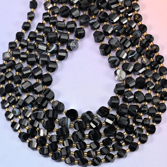 Faceted spiral twist cut dyed black strip agate beads