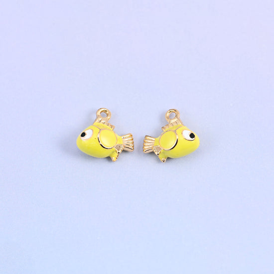 Fish charms front and back, the yellow green enamel sitting between yellow and green.