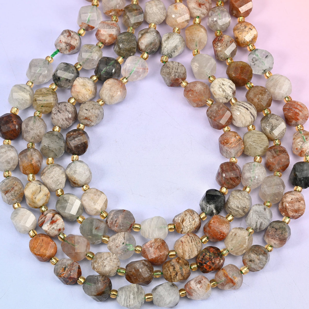 Thousand Layer Phantom Quartz natural crystal beads, 15 inch strand of approximately 31 beads, centre drilled 1.2mm hole