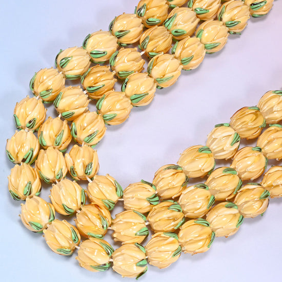 Creamy yellow tulip flower bud lampwork glass beads, 11 inch strand
