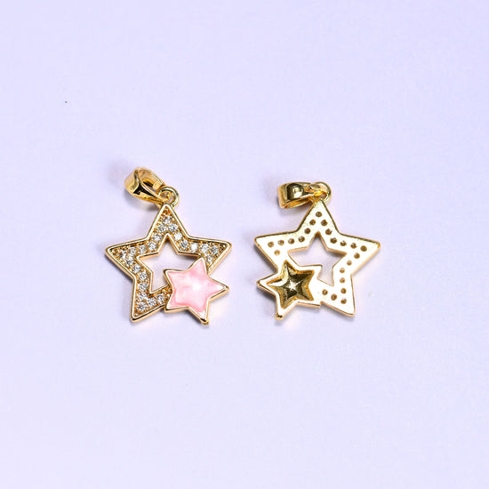 Front and back of the Double Stars Zirconia Charm, pink shell star with zirconia pave on the left and the dotted plain gold reverse on the right.
