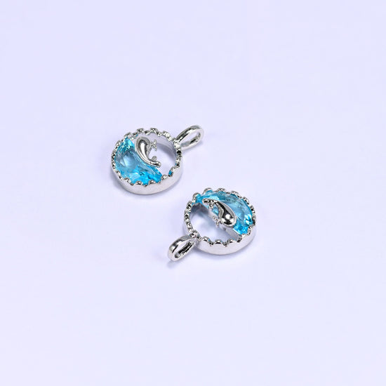 Platinum plated whale charm, sold individually